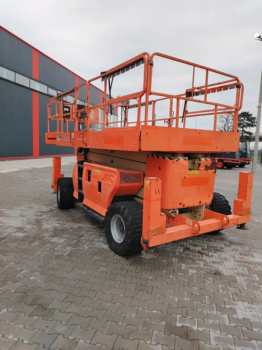 Makazasta platforma JLG • 4394RT, godište 2003 • 1